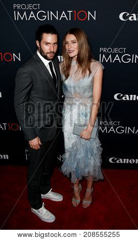 NEW YORK- OCT 24: Phil Winser (L) and Dree Hemingway attend the global premiere of Canon's 