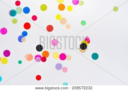 Festive party or carnival confetti on pink background