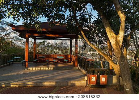 Sanya, China - April 07, 2017: Evening arbor on top of a hill in a Luhuitou Park