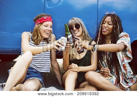 Friends Drinking Alcohol Beers Together on Road Trip Journey