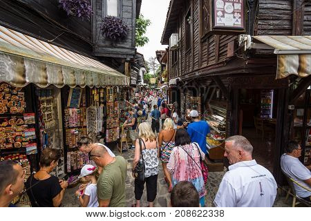 NESEBAR BULGARIA - AUGUST 21 2017: Tourists in the old town. Nesebar is an ancient city and one of the major seaside resorts on the Bulgarian Black Sea Coast.