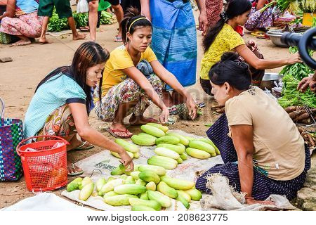 Dawei Myanmar - July 12 2015: Fresh market where sellers and buyers meet to sell and buy fresh and raw food in Dawei Myanmar