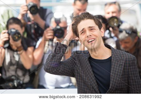 CANNES, FRANCE - MAY 19, 2016: Xavier Dolan attends the 'It's Only The End Of The World (Juste La Fin Du Monde)'  photocall during the 69th annual Cannes Film Festival at the Palais des Festivals 