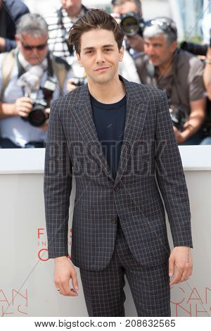 CANNES, FRANCE - MAY 19, 2016: Xavier Dolan attends the 'It's Only The End Of The World (Juste La Fin Du Monde)'  photocall during the 69th annual Cannes Film Festival at the Palais des Festivals 