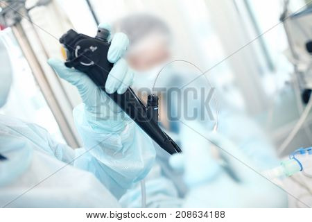 Endoscopic examination to the patient in the intensive care unit.