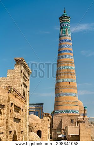 Islam Khodja Minaret at Itchan Kala. A UNESCO heritage site in Khiva, Uzbekistan