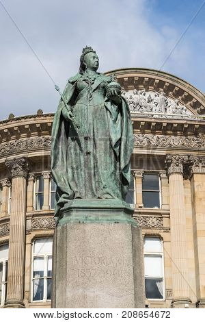 Birmingham, UK, October 3rd, 2017 : Statue of Queen Victoria in Birmingham, UK, Birmingham city council in the background.