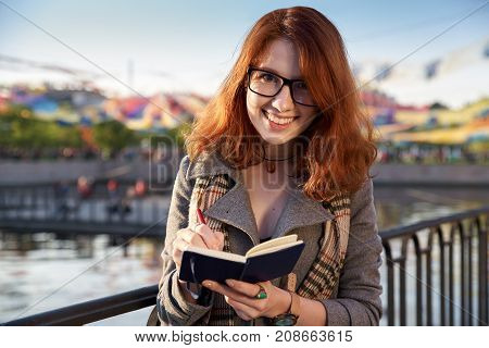 attractive young student can be the first in everything thanks to her snow-white smile and the planning of each day.