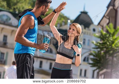 Sports Couple Giving Highfive