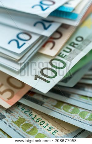 Euro and USA dollar money banknotes background wealth concept