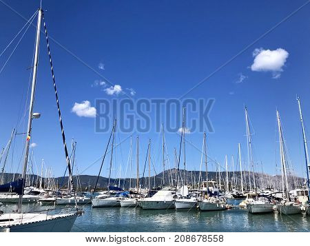 Top view of the marina with a lot of yachts and boats - shooting from a drone