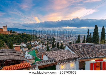 Walls and towers of the fortress of the Alhambra at sunset in Granada. Andalusia. Spain.