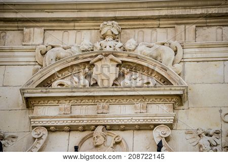 Details of stone sculptures of the facade of the University of AlcalÃÂ¡ de Henares. Madrid, Spain