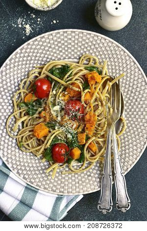 Whoolegrain Spaghetti With Spinach,pumpkin And Tomatoes.top View.