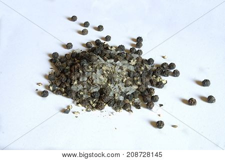Salt and peppar. Salt and peppar on White background, isolated. Big salt chunks and big black peppar pieces