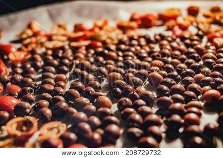 Rose hip and buck thorn drying in oven