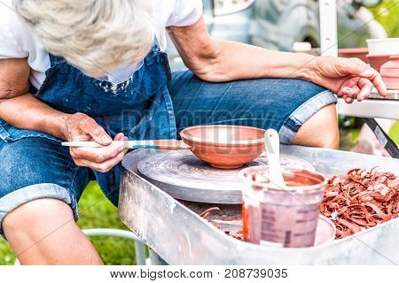 Silver Spring, Usa - September 16, 2017: Woman Pottery Maker Shaping Clay Bowl During Class Or Demos