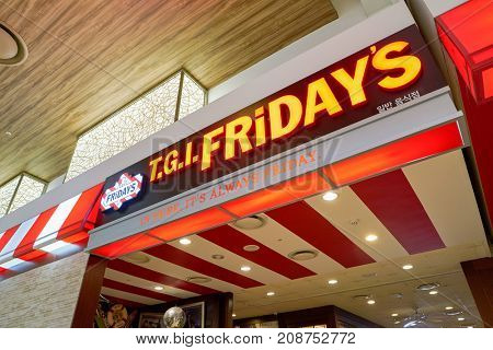BUSAN, SOUTH KOREA - MAY 28, 2017: TGI Fridays at Lotte Department Store. TGI Fridays is an American restaurant chain focusing on casual dining.