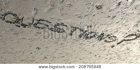Word Questions With Question Mark Written On The Sand Can Be Use