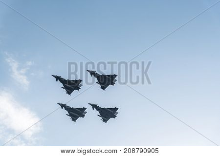 Madrid Spain - October 12 2017: Four Eurofighter jet flying in Spanish National Day Parade. Short after the parade one of them crashed while landing on Albacete air base.