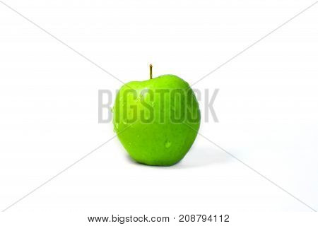wet green apple on white background after the rain