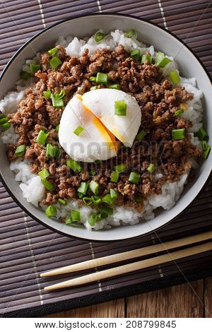 Beef Soboro With Egg Poached, Rice And Green Onion Close-up. Vertical Top View