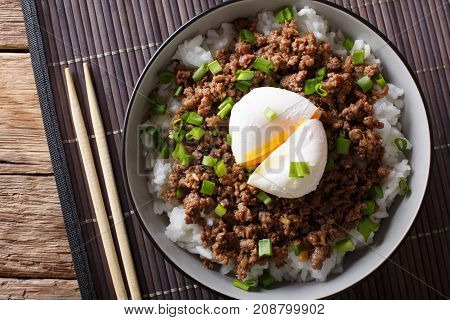 Beef Soboro With Egg Poached, Rice And Green Onion Close-up. Horizontal Top View