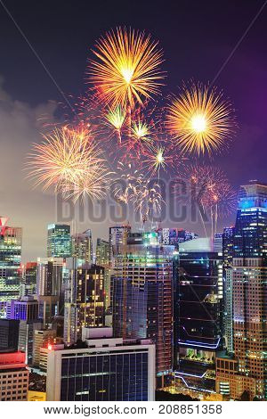 Firework Over Cityscape Of Singapore City At Night