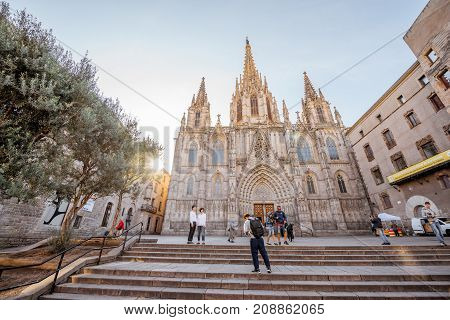 BARCELONA, SPAIN - August 16, 2017: Tourists visit famous cathedral of Santa Eulalia during the morning in the old town of Barcelona city