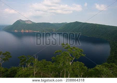 Mount Kamui and the beautiful clear blue Lake Mashu, Hokkaido, Japan