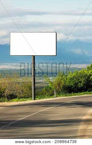 Horizontal blank billboard for outdoor advertising next to the road. Blank white mockup  poster.Template for advertising