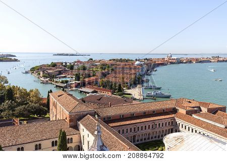 VENICE ITALY - SEPTEMBER 21 2017: Aerial view on San Giorgio Monastery and Giudecca island. It is an island in the Venetian Lagoon separated from the central islands of Venice by the Giudecca Canal.