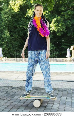 Girl On Oval Wooden Deck For Balance Board. Plastic Roller For Balance Board. Rocker-roller Boards.
