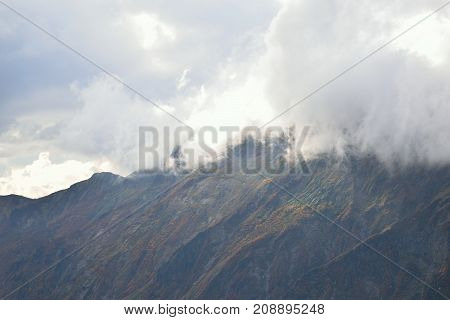 Autumn Landscape of vibrant colorful trees with mountain ranges in Japan