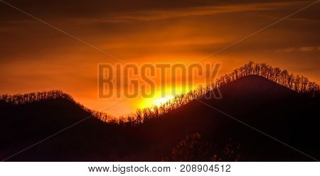 Dramatic sunrise on the Blue Ridge Parkway in the state of North Carolina on a cool autumn morning