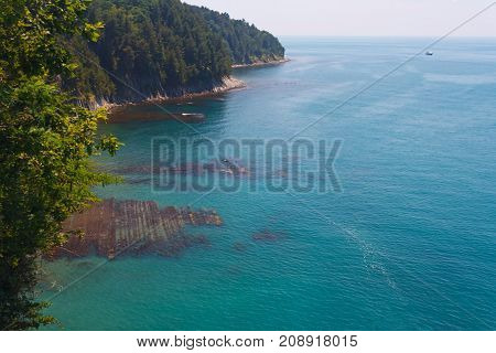 Beautiful view from the high coast to the sea and the shore with coastal reefs