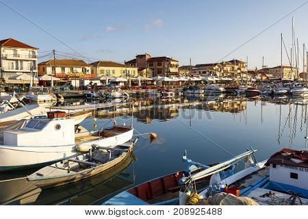 NYDRI, GREECE - OCTOBER 2, 2017: Coffee shops and restaurants in the harbour of Lefkada town, Greece on October 2, 2017.