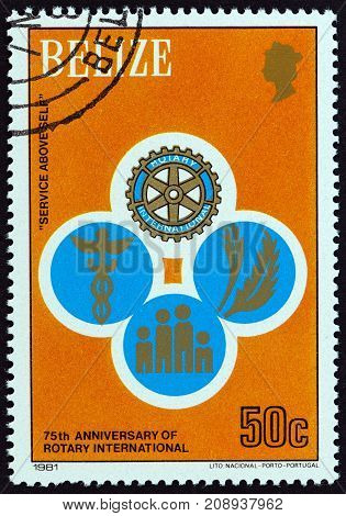 BELIZE - CIRCA 1981: A stamp printed in Belize from the "75th anniversary of Rotary International" issue shows emblems of Rotary activities, circa 1981.