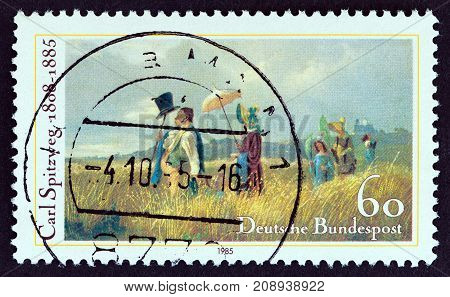 GERMANY - CIRCA 1985: A stamp printed in Germany issued for the death centenary of painter Carl Spitzweg shows Sunday Walk, circa 1985.