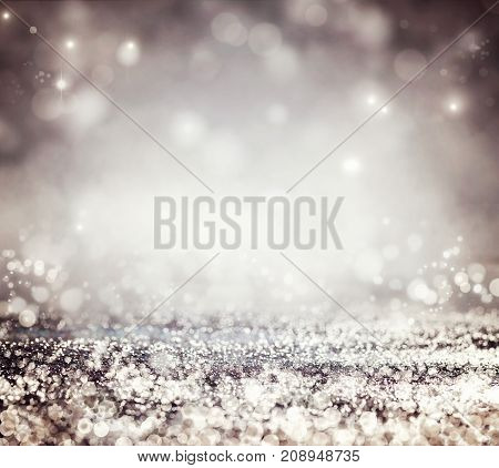 Festive background. Bokeh blurred background. Glitter vintage lights