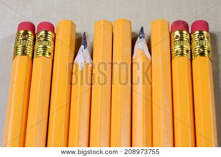Crayons And Pencil Sharpener On A Wooden Office Table. Crayons With Sharpening Crayons And Pencils O
