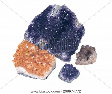 Collection of amethyst and citrine druzy clusters, isolated on white background