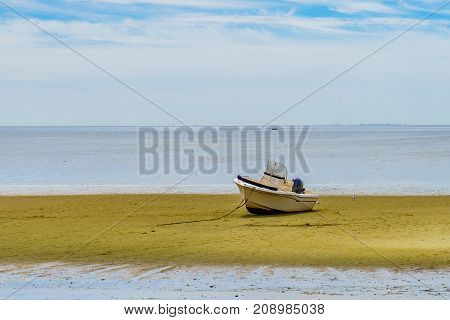 Boats in the Provincetown Coast at low tide MA USA
