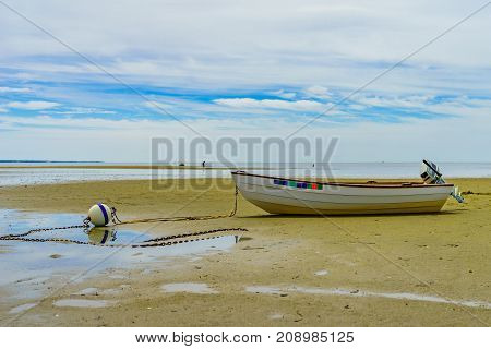 Boats in the Provincetown Coast at low tide MA USA