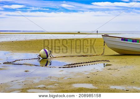 Boats in the Provincetown Coast at low tide MA USA