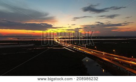 Sunset over Mobile Bay and interstate 10