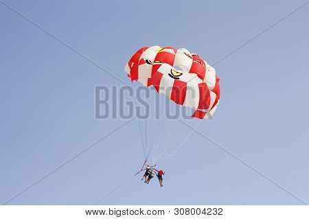 Paraglider With A Saddle For People. Parasales - Water Parachutes. Bright Colours.