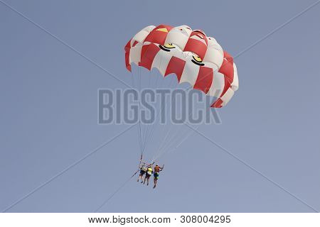 Paraglider With A Saddle For People. Parasales - Water Parachutes. Bright Colours.