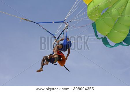 Paraglider With A Saddle For People. Parasales - Water Parachutes. Bright Colours.