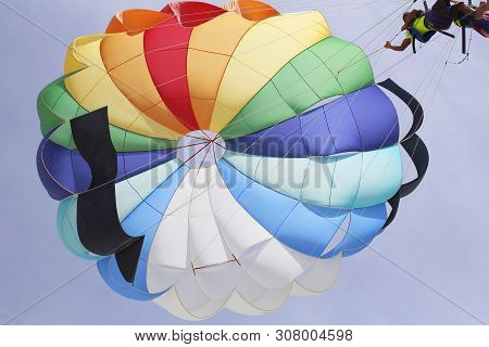 Paraglider With A Saddle For People. Parasales - Water Parachutes. Bright Colours.